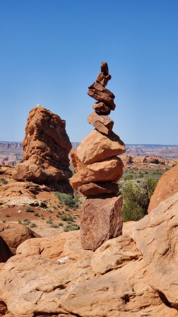 stack of rocks with blue sky